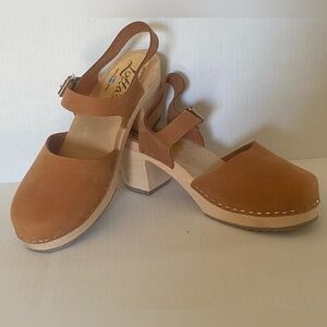 Lotta from Stockholm buckled, enclosed toe clog. Oiled Nu-buck leather upper.